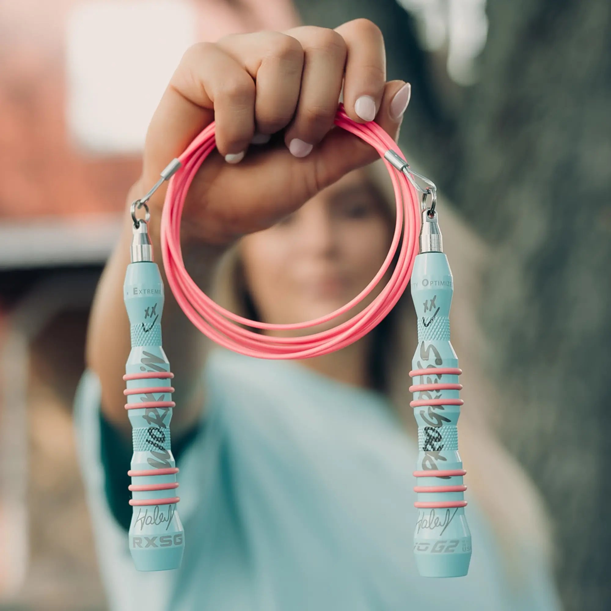 Haley_Adams_Limited_Edition_EVO_G2_Speed_Rope_holding rope in front her face
