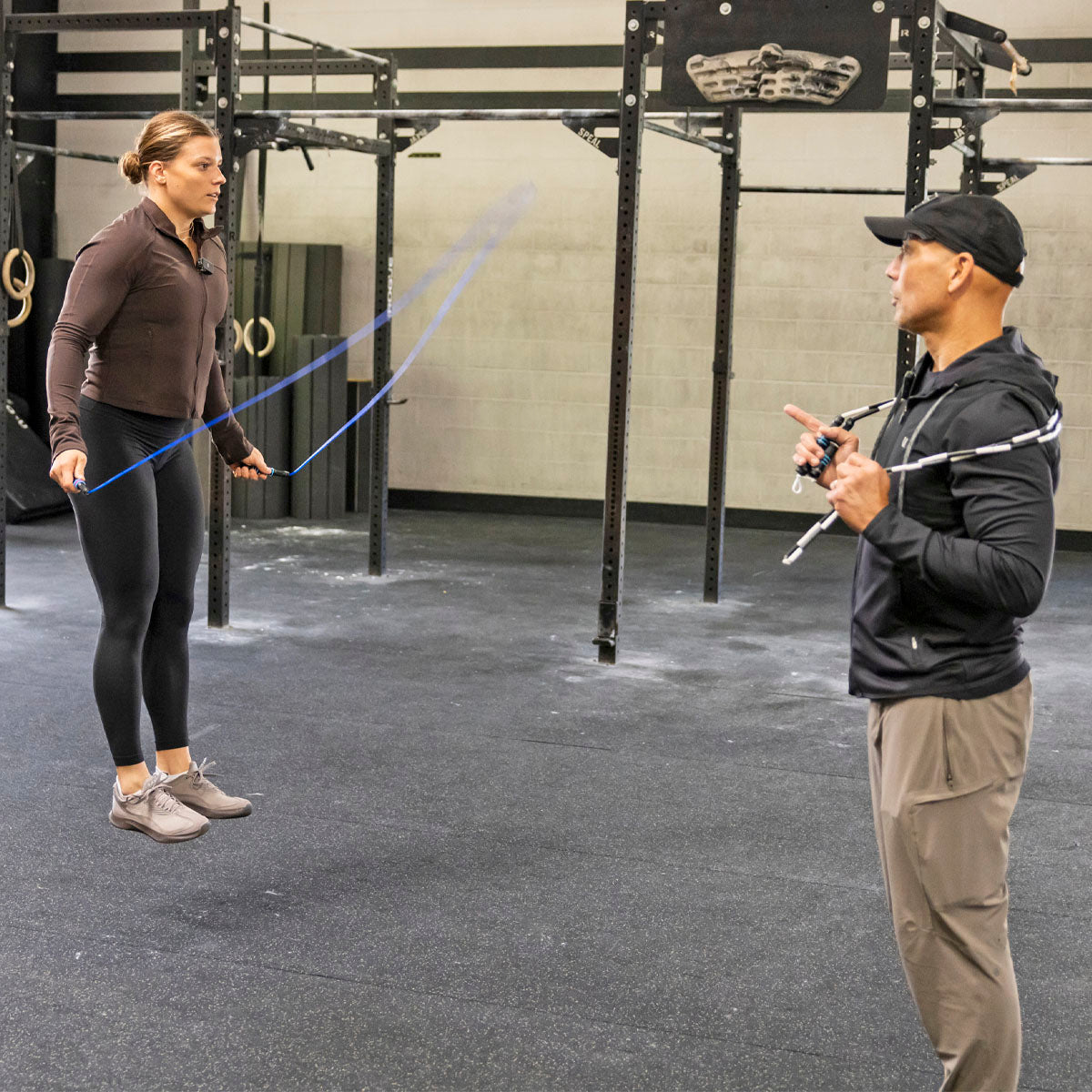 Coach Dave Newman jump 
rope training with Laura Horvath