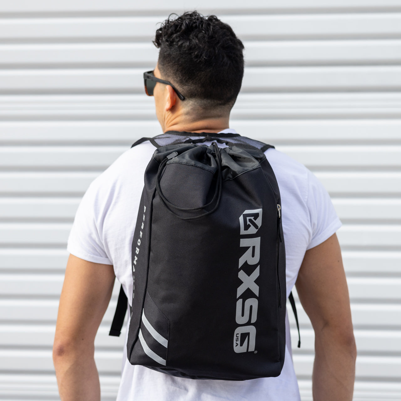 RXSG Drawstring Backpack on someone's back